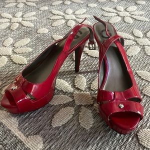 Red heels on the left heel is a little mark they are in great condition